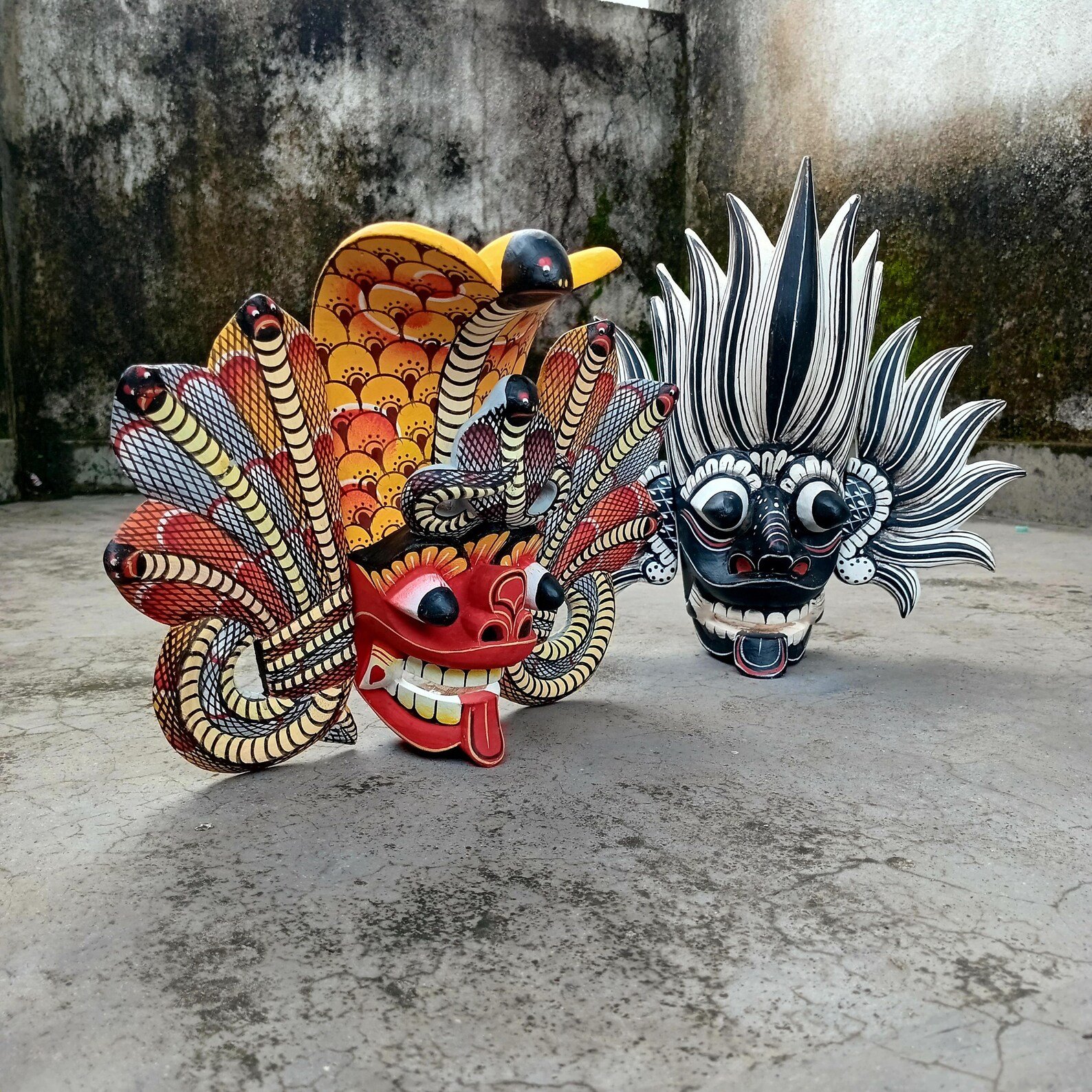 Explore Sri Lanka’s Fire Demon and Cobra Masks: Cultural Treasures for Protection and Power. Artistry that Safeguards and Inspires