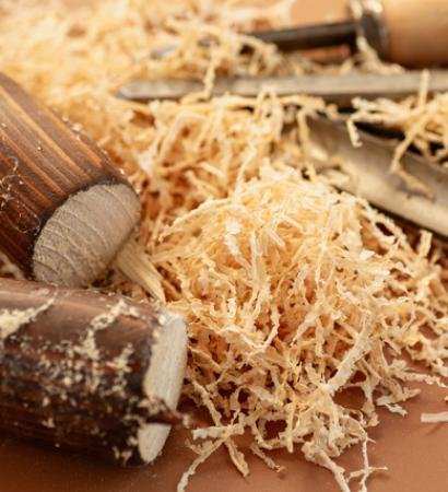 Workshop with tools on brown background.